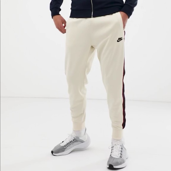 nike joggers side stripe